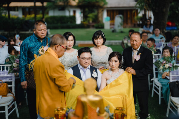 Buddhist wedding blessing for Agus and Vivi at a luxury Bali resort